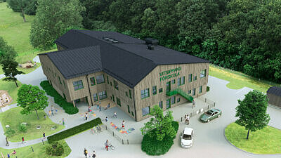 Renderingsbild som visar en förskola uppifrån, intill en skog.